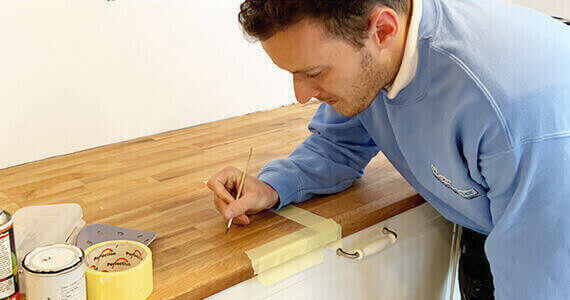 Bath Repair Manchester - Surface Doctor expert technician performing professional bathroom restoration using advanced repair techniques and precision tools in Manchester home
