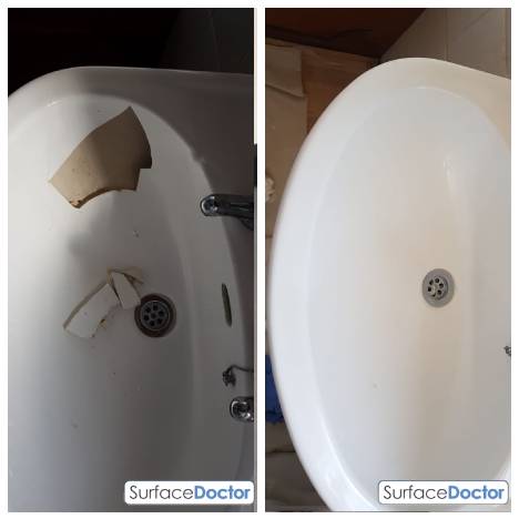 Bath re-enamelling Manchester specialist work demonstration - Surface Doctor expert applying precision enamel coating using professional spray equipment for factory-quality finish in Didsbury bathroom